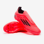 حذاء كرة قدم F50 Pro Laceless FG للأطفال من أديداس