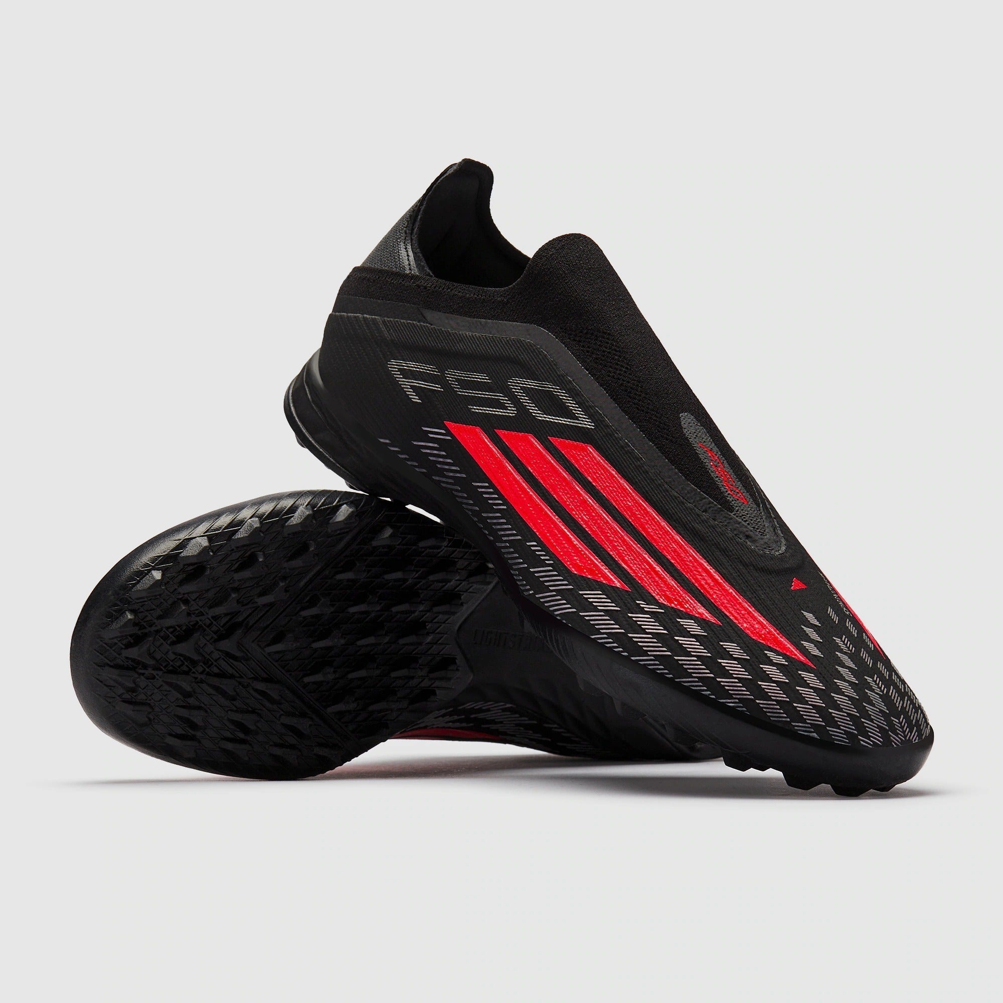 حذاء كرة قدم F50 Pro Laceless TF من أديداس