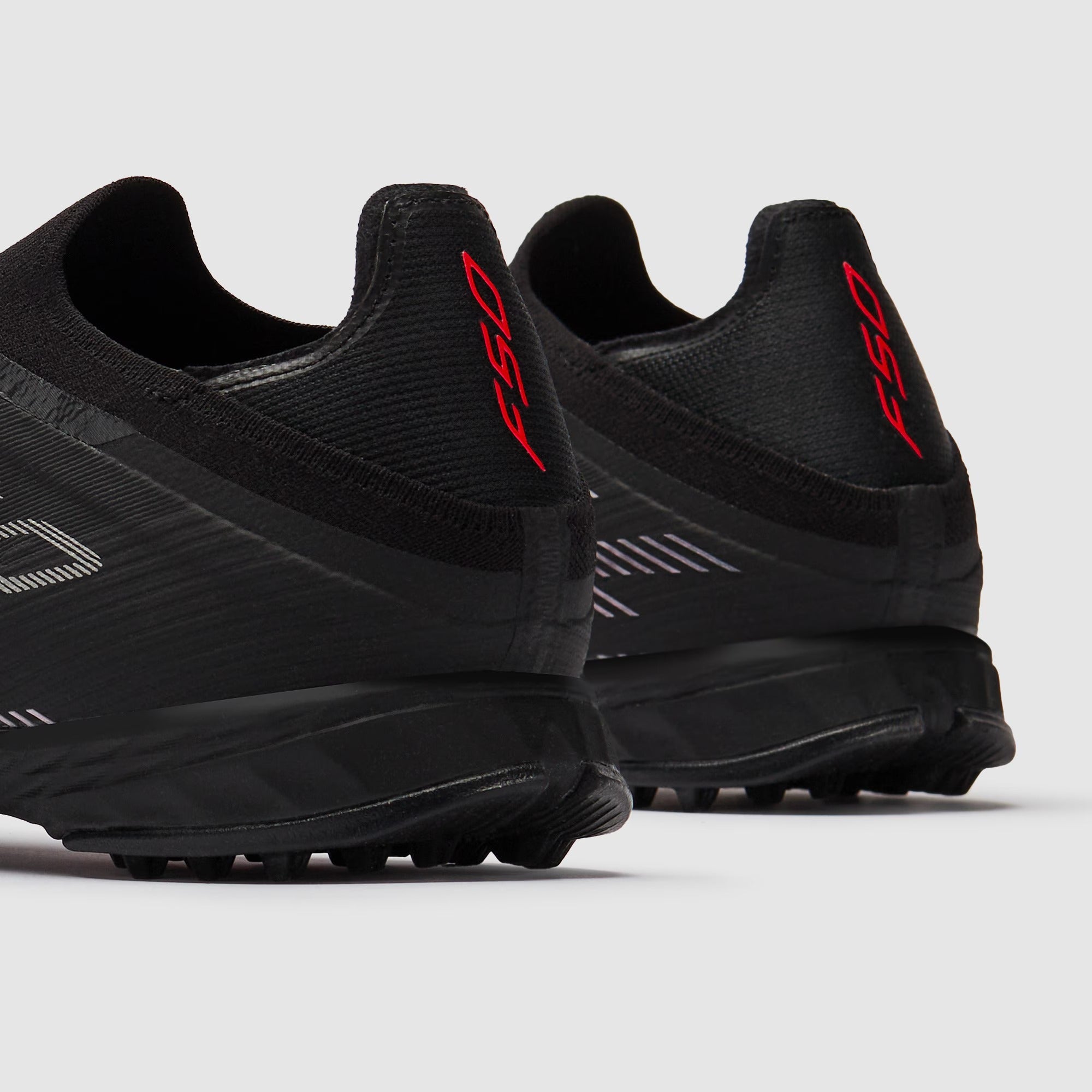 حذاء كرة قدم F50 Pro Laceless TF من أديداس